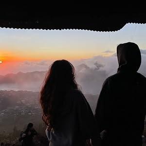 Giulia Dodeci at sunrise, looking out over the clouds.